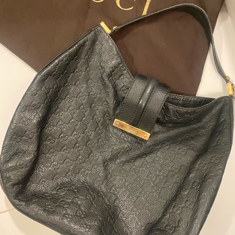 Gucci embossed leather hobo bag